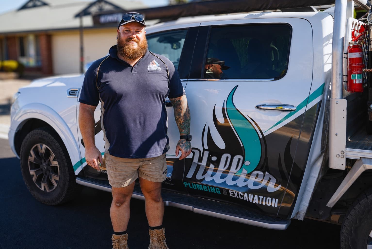 Josh Hillier, owner, beside the Hillier service vehicle